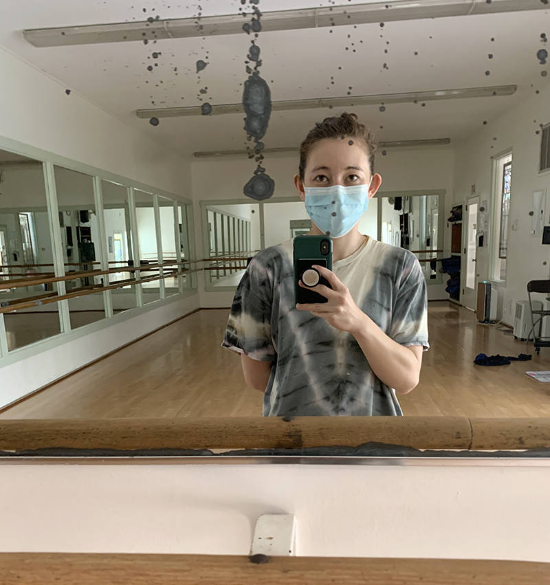 Erin selfie looking in studio mirror